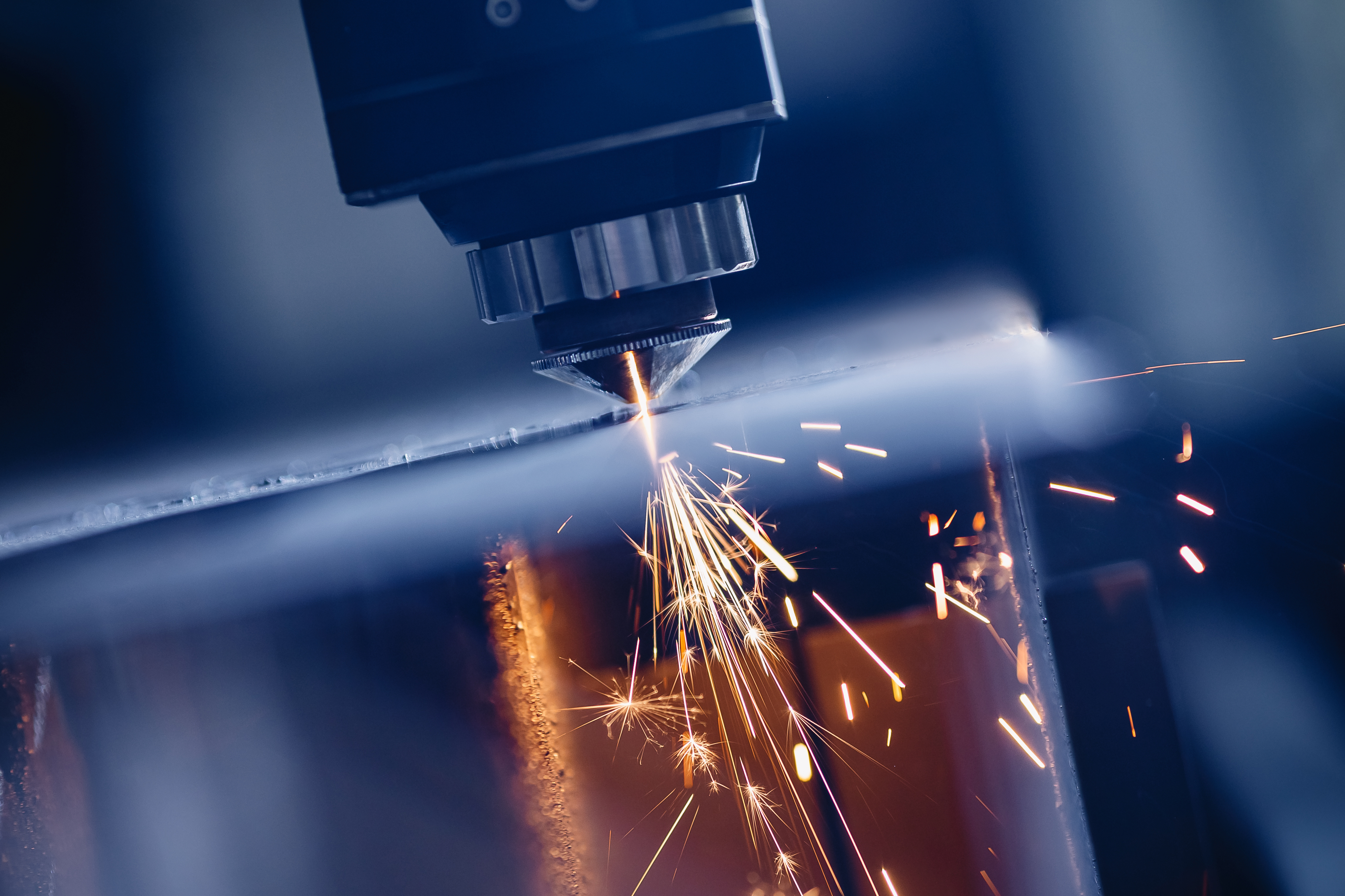 Industrial machine in motion, reflecting the zero-trust approach in manufacturing where no access is assumed to be safe by default | DXC Technology Insights