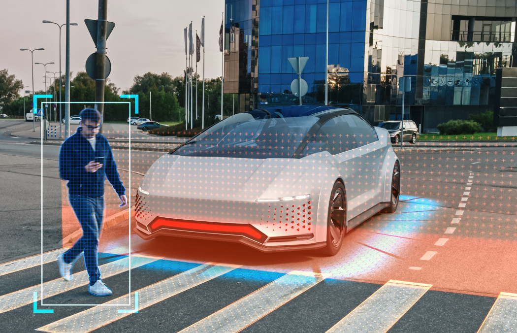 Man walking over zebra crossing detected by autonomous car, Software solutions defining the future of automotive | DXC Technology