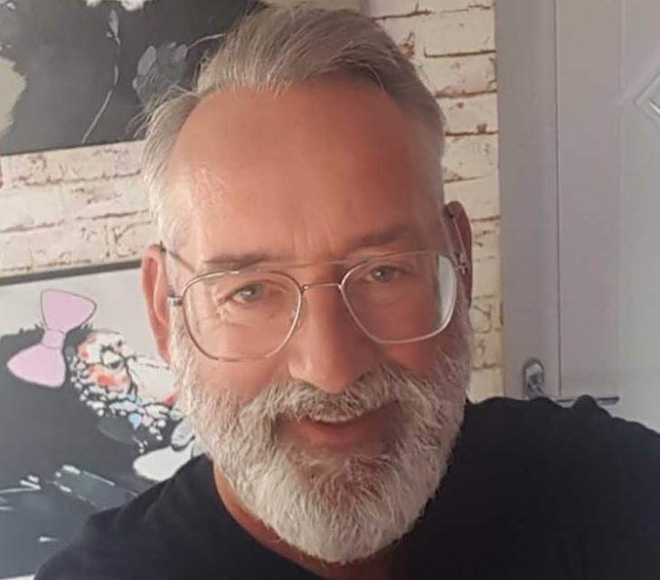 headshot of Dave Wilson, a chief technologist in Banking & Capital Markets and researcher at DXC Technology