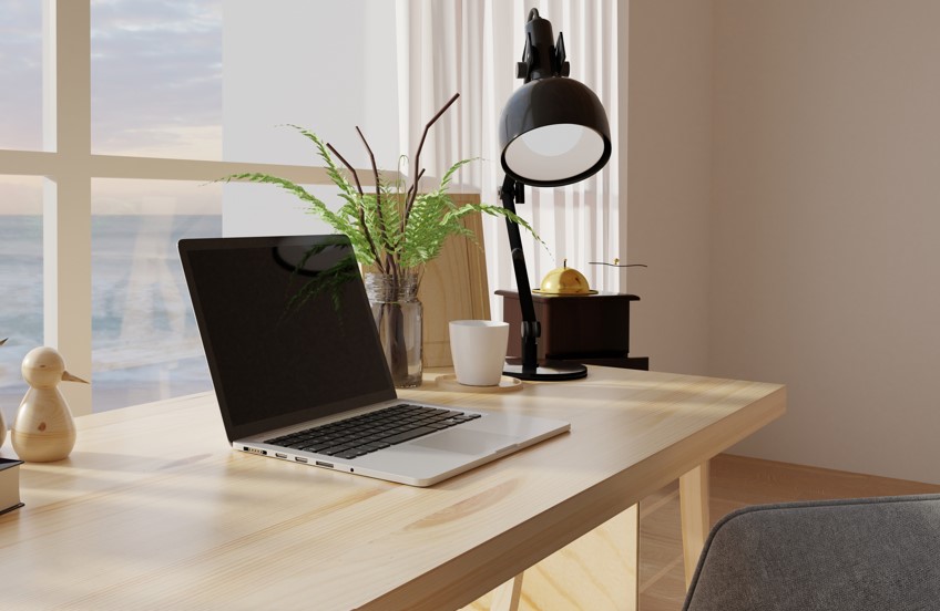 home office with laptop on desk facing window, Modern Device Management | DXC Technology Insights